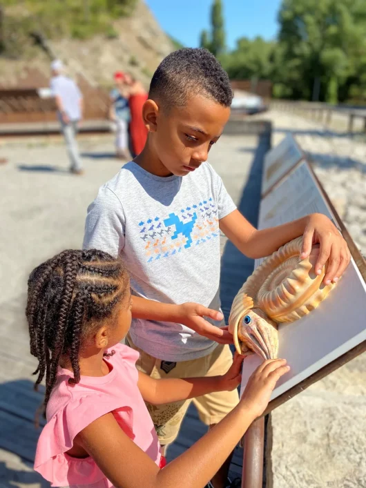 Children benefit from the educational facilities of the ammonite slab site