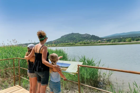 Family on an observation platform on the banks of the Durance