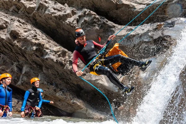 Canyoning in Haute Provence, abseiling in the waterfall